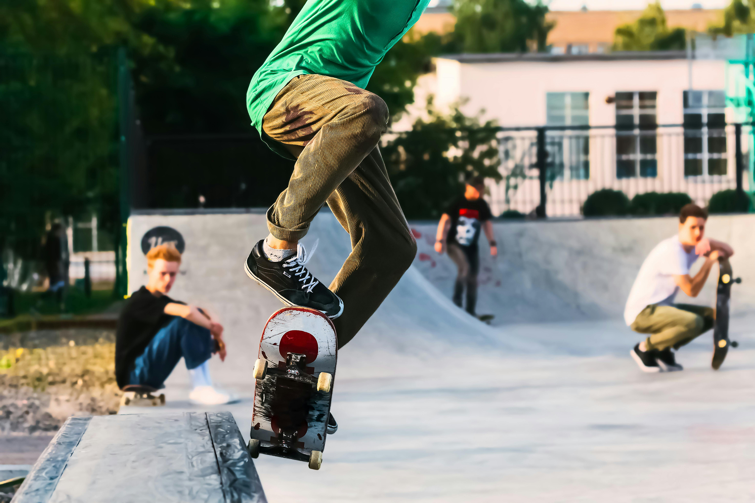 Kid on scooter at skatepark